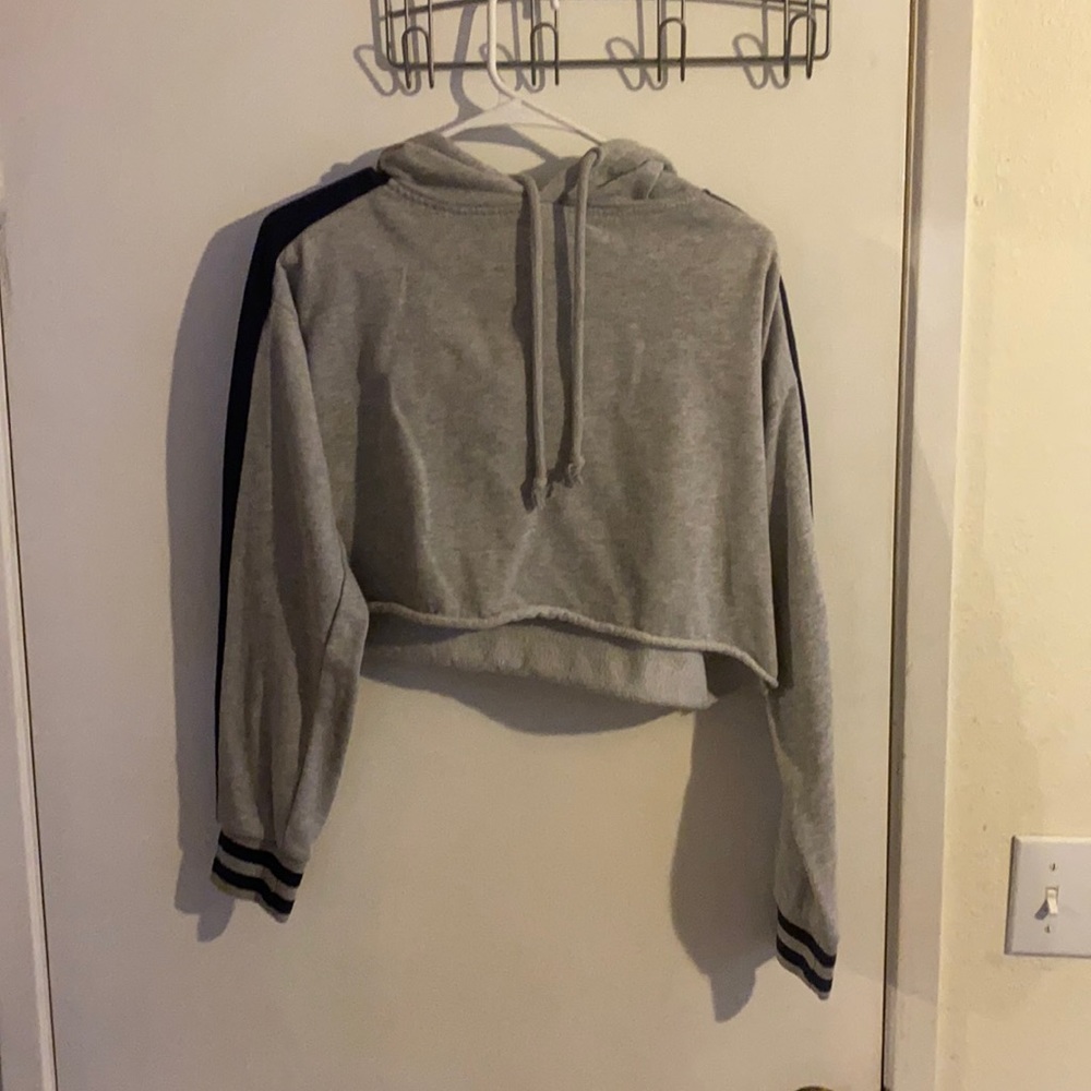 cropped grey hoodie.
